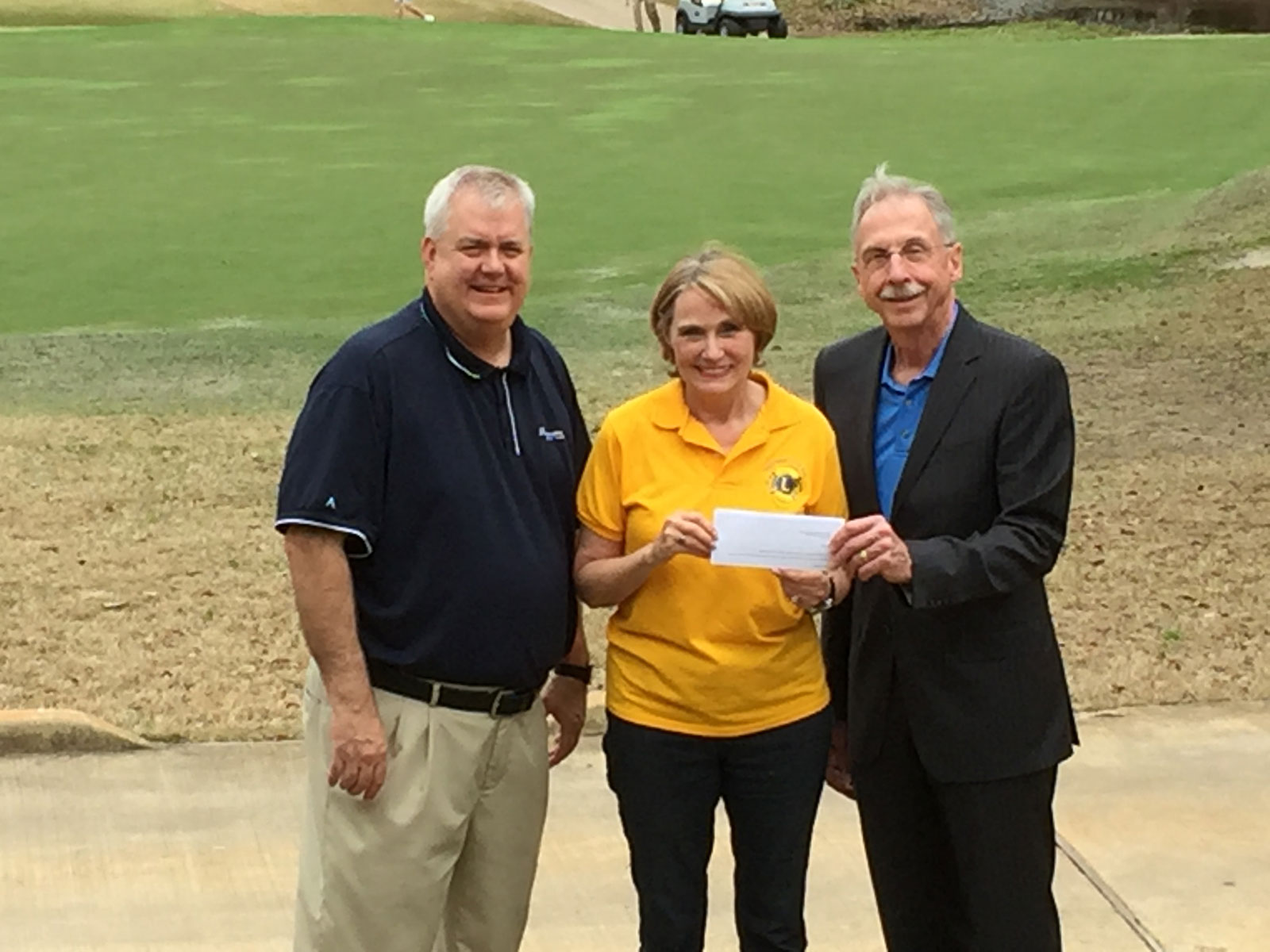 The Woodlands Hills signs as Title Sponsor of Lions Club Golf Tournament