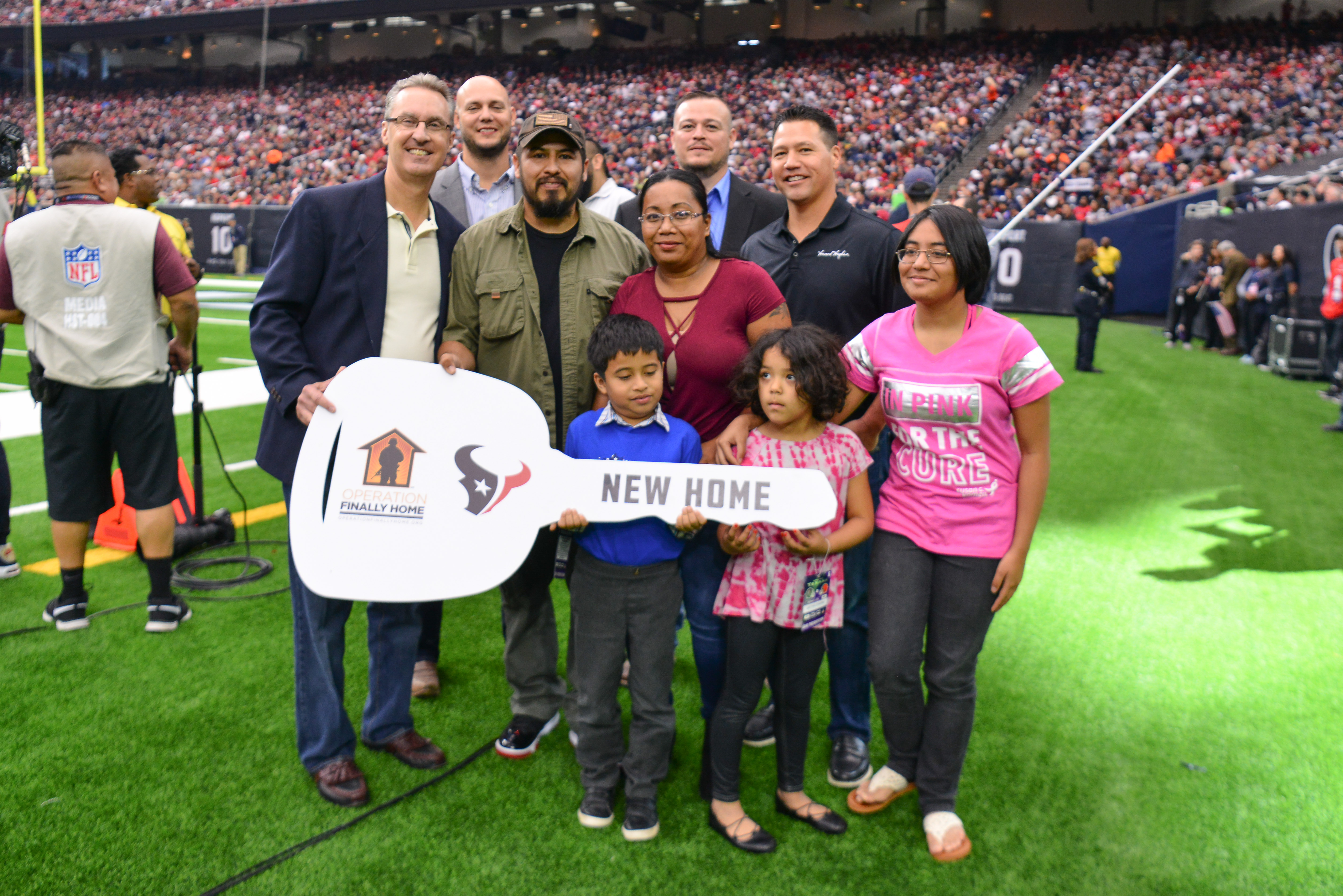 Veteran Surprised at Houston Texans Game with a Mortgage-Free Home in The Woodlands Hills!